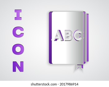 Paper cut ABC book icon isolated on grey background. Dictionary book sign. Alphabet book icon. Paper art style. Vector