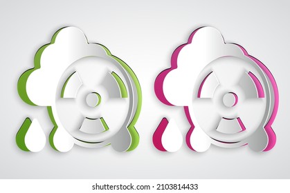 Paper cut Acid rain and radioactive cloud icon isolated on grey background. Effects of toxic air pollution on the environment. Paper art style. Vector
