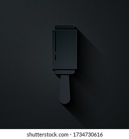 Paper cut Adhesive roller for cleaning clothes icon isolated on black background. Getting rid of debris, dust, hair, fluff, pet wool. Paper art style. Vector Illustration