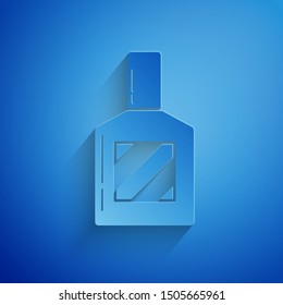 Paper cut Aftershave icon isolated on blue background. Cologne spray icon. Male perfume bottle. Paper art style. Vector Illustration