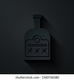 Paper cut Alcohol drink Rum bottle icon isolated on black background. Paper art style. Vector Illustration