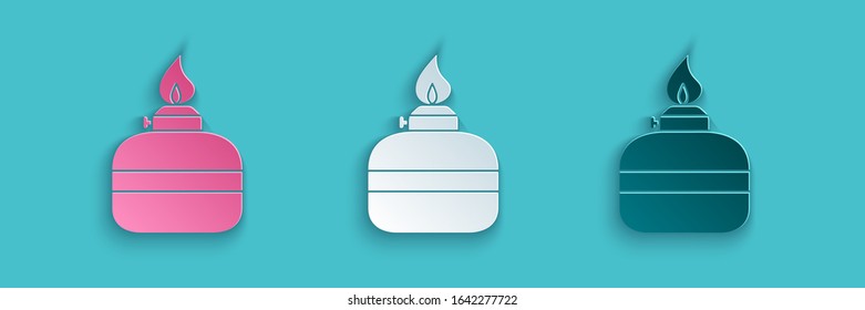 Paper cut Alcohol or spirit burner icon isolated on blue background. Chemical equipment. Paper art style. Vector Illustration