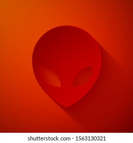 Paper cut Alien icon isolated on red background. Extraterrestrial alien face or head symbol. Paper art style. Vector Illustration