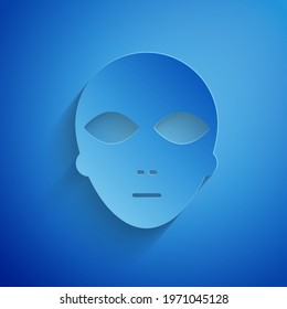 Paper cut Alien icon isolated on blue background. Extraterrestrial alien face or head symbol. Paper art style. Vector Illustration