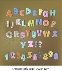 paper cut alphabet with staplers and glue tape