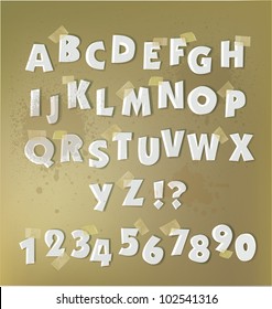 paper cut alphabet with staplers and glue tape