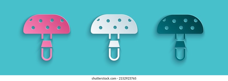 Paper cut Amanita muscaria or fly agaric hallucinogenic toadstool mushroom icon isolated on blue background. Spotted poisonous mushroom. Paper art style. Vector
