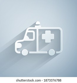 Paper cut Ambulance and emergency car icon isolated on grey background. Ambulance vehicle medical evacuation. Paper art style. Vector