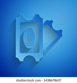 Paper cut American Football ticket icon isolated on blue background. Paper art style. Vector Illustration