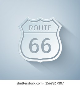 Paper cut American road icon isolated on grey background. Route sixty six road sign. Paper art style. Vector Illustration