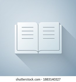 Paper cut Ancient magic book with alchemy recipes and mystic spells and enchantments icon isolated on grey background. Paper art style. Vector