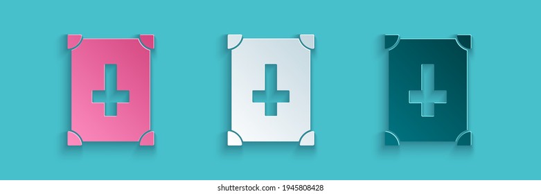 Paper cut Ancient magic book with alchemy recipes and mystic spells and enchantments icon isolated on blue background. Paper art style. Vector