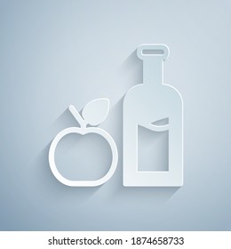 Paper cut Apple cider bottle icon isolated on grey background. Beverage glass bottle. Paper art style. Vector.
