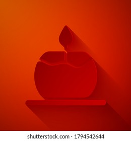 Paper cut Aroma candle icon isolated on red background. Paper art style. Vector