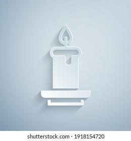 Paper cut Aroma candle icon isolated on grey background. Paper art style. Vector.