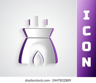 Paper cut Aroma candle icon isolated on grey background. Paper art style. Vector