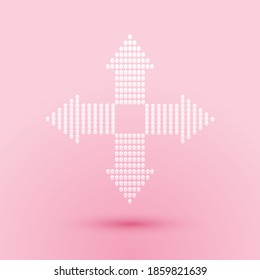 Paper cut Arrows dots in four directions icon isolated on pink background. Paper art style. Vector.