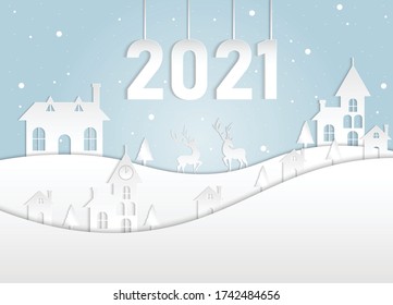 Paper cut artwork. White christmas. 2021 greeting card. White and light blue christmas theme.