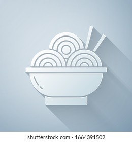 Paper cut Asian noodles in bowl and chopsticks icon isolated on grey background. Street fast food. Korean, Japanese, Chinese food. Paper art style. Vector Illustration