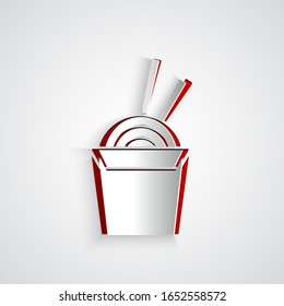 Paper cut Asian noodles in paper box and chopsticks icon isolated on grey background. Street fast food. Korean, Japanese, Chinese food. Paper art style. Vector Illustration