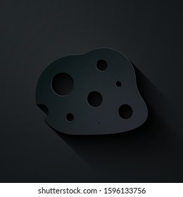 Paper cut Asteroid icon isolated on black background. Paper art style. Vector Illustration