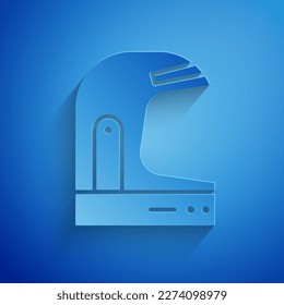 Paper cut Astronaut helmet icon isolated on blue background. Paper art style. Vector Illustration