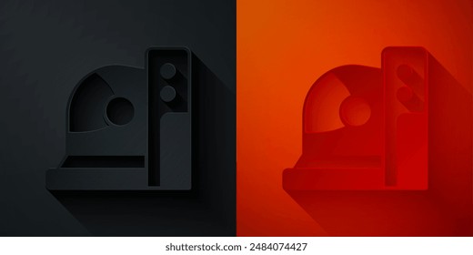 Paper cut Astronaut helmet icon isolated on black and red background. Paper art style. Vector