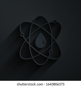 Paper cut Atom icon isolated on black background. Symbol of science, education, nuclear physics, scientific research. Paper art style. Vector Illustration