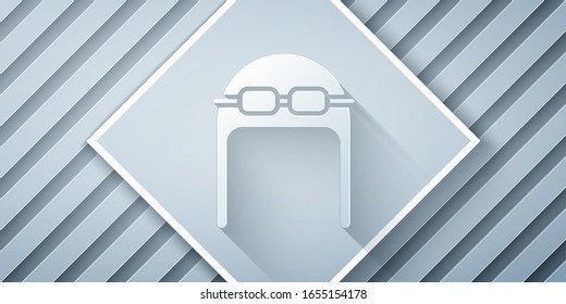 Paper cut Aviator hat with goggles icon isolated on grey background. Pilot hat. Paper art style. Vector Illustration