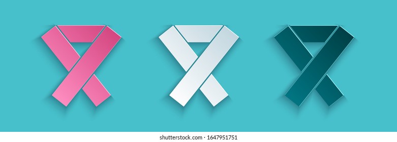 Paper cut Awareness ribbon icon isolated on blue background. Public awareness to disability, medical conditions and health. Paper art style. Vector Illustration