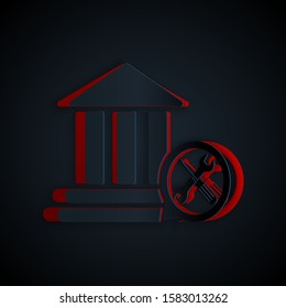 Paper cut Bank building with screwdriver and wrench icon isolated on black background. Adjusting, service, setting, maintenance, repair, fixing. Paper art style. Vector Illustration