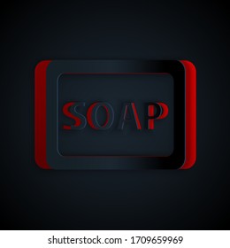 Paper cut Bar of soap with foam icon isolated on black background. Soap bar with bubbles. Paper art style. Vector Illustration