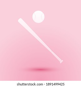 Paper cut Baseball ball and bat icon isolated on pink background. Paper art style. Vector.