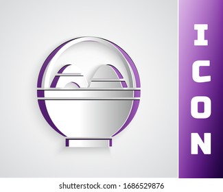 Paper cut Basket with easter eggs icon isolated on grey background. Happy Easter. Paper art style. Vector Illustration