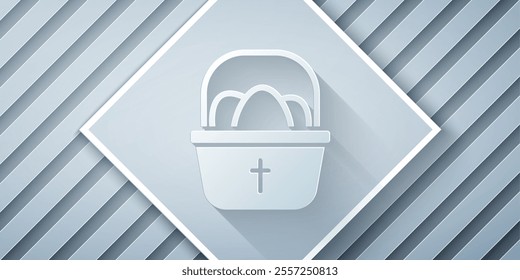 Paper cut Basket with easter eggs icon isolated on grey background. Happy Easter. Paper art style. Vector