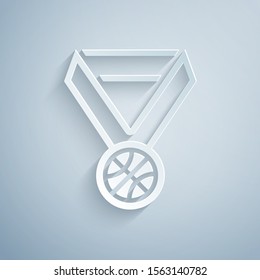 Paper cut Basketball medal with ribbon icon isolated on grey background. Paper art style. Vector Illustration
