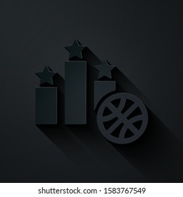 Paper cut Basketball over sports winner podium icon isolated on black background. Paper art style. Vector Illustration