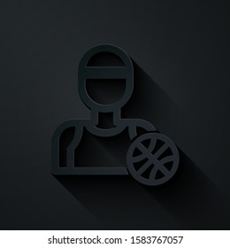 Paper cut Basketball player icon isolated on black background. Paper art style. Vector Illustration