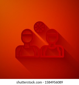 Paper cut Basketball players icon isolated on red background. Paper art style. Vector Illustration
