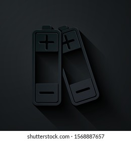 Paper cut Battery icon isolated on black background. Lightning bolt symbol. Paper art style. Vector Illustration