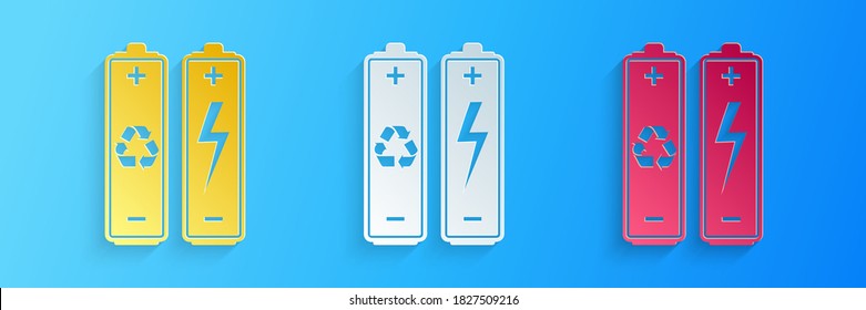 Paper cut Battery with recycle symbol - renewable energy concept icon isolated on blue background. Paper art style. Vector.