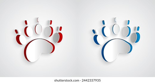 Paper cut Bear paw footprint icon isolated on grey background. Paper art style. Vector