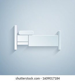 Paper cut Bed icon isolated on grey background. Paper art style. Vector Illustration