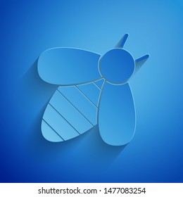 Paper cut Bee icon isolated on blue background. Sweet natural food. Honeybee or apis with wings symbol. Flying insect. Paper art style. Vector Illustration