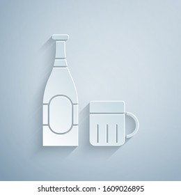 Paper cut Beer bottle and glass icon isolated on grey background. Alcohol Drink symbol. Paper art style. Vector Illustration
