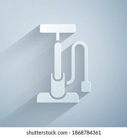 Paper cut Bicycle air pump icon isolated on grey background. Paper art style. Vector