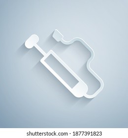 Paper cut Bicycle air pump icon isolated on grey background. Paper art style. Vector.