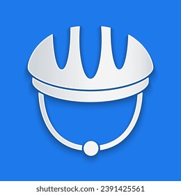 Paper cut Bicycle helmet icon isolated on blue background. Extreme sport. Sport equipment. Paper art style. Vector