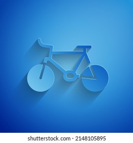 Paper cut Bicycle icon isolated on blue background. Bike race. Extreme sport. Sport equipment. Paper art style. Vector