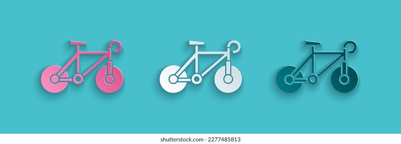 Paper cut Bicycle icon isolated on blue background. Bike race. Extreme sport. Sport equipment. Paper art style. Vector